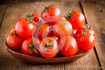 Fresh organic cherry tomatoes in a bowl Stock Photo