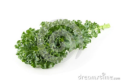 Fresh organic green kale leaves isolated over white background Stock Photo