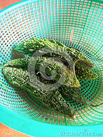 Fresh Organic karela in a basket Stock Photo