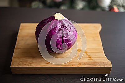 Fresh Organic Red Cabbage Close Up on Wooden Board - Vibrant and Nutrient-Rich Beauty Stock Photo