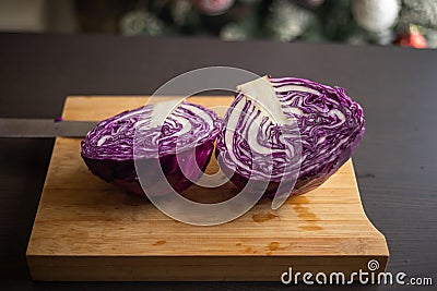 Fresh Organic Red Cabbage CloseUp on Wooden Board - Vibrant and Nutrient-Rich Beauty Stock Photo