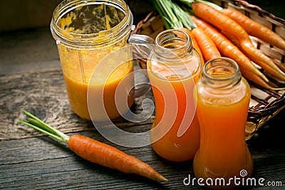 Fresh organic smoothie and ripe carrot juice Stock Photo