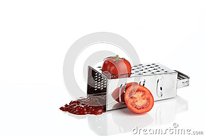 Grated Tomato Producing Tomato Sauce Stock Photo