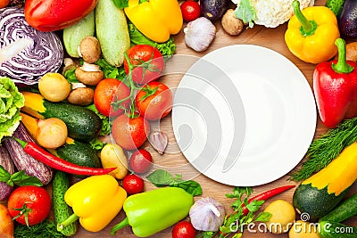 Fresh Organic Vegetables Around White Plate Stock Photo