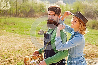 Fresh organic vegetables from the farm. Gardening in spring - happy couple harvesting and having lots of fun. Portrait Stock Photo