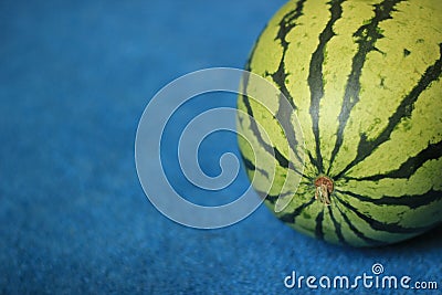 Fresh Organic Watermelon on blue background Stock Photo