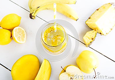 Fresh organic yellow smoothie with banana, apple, mango, pear, p Stock Photo