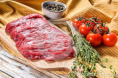 Fresh outside skirt steak on a chopping Board. White background. Top view Stock Photo