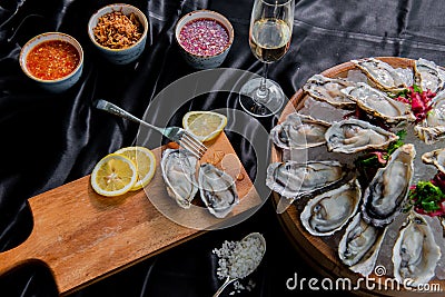 Fresh Oysters with lemon slice Stock Photo