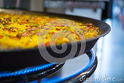 Fresh paella being cooked Stock Photo