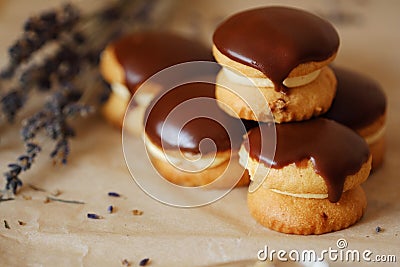 Fresh pastries cakes Boucher and lavender on the table Stock Photo