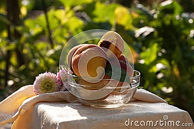 Fresh peaches in glass bowl Stock Photo