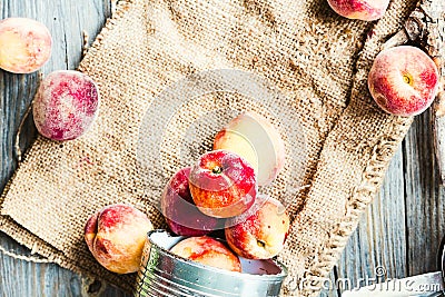 Fresh peaches in a tin, space for text,healthy raw food Stock Photo