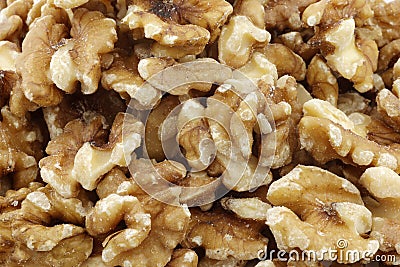 Fresh peeled walnuts background Stock Photo