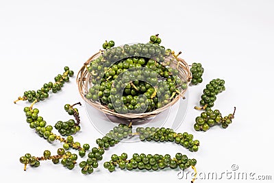 Fresh Peppercorn Berries ,Green pepper seeds in the basket Stock Photo
