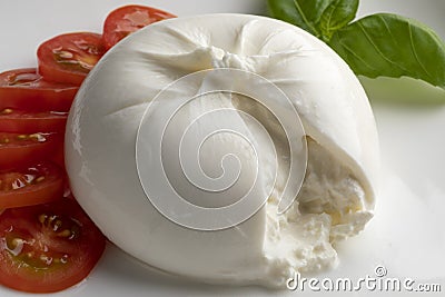 Fresh piece burrata cheese close up on white background Stock Photo