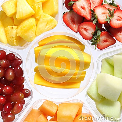 Fresh pieces of fruits in plastic container Stock Photo