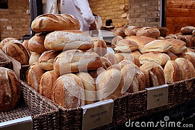 Fresh pile of breads for sale in the Mahane Yehuda market, in a bakery Stock Photo