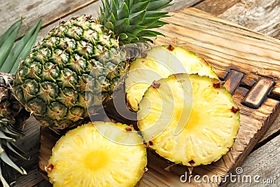 Fresh pineapple on board Stock Photo