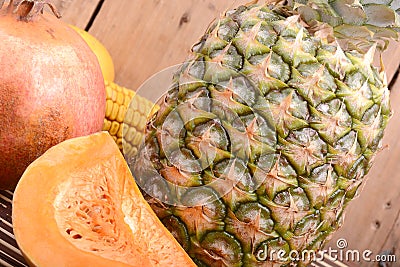 Fresh pineapple with corn and orange Stock Photo