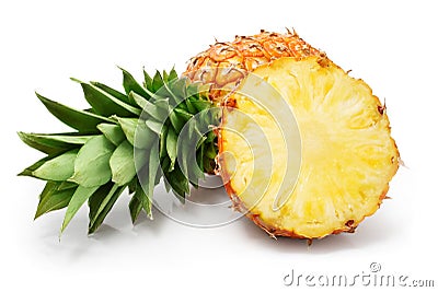 Fresh pineapple fruits with cut and green leaves Stock Photo