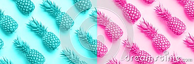 Fresh pineapples on trendy neon pink and blue color background. Top View. Pop art design, creative concept. Copy Space. Bright Stock Photo