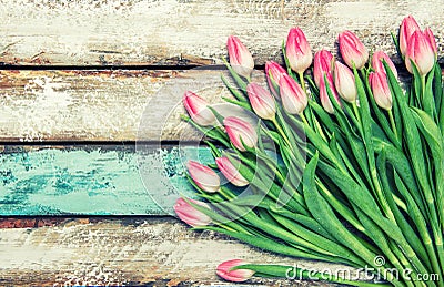 Fresh pink tulips water drops wooden background Stock Photo