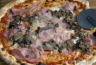 Fresh Pizza....prosciutto and mushroom Stock Photo