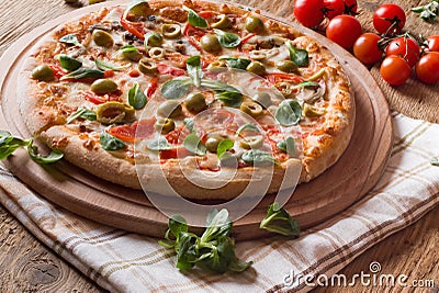 Fresh pizza on wood Stock Photo