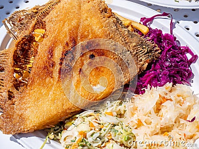 Fresh plaice fried on the Baltic Sea Stock Photo