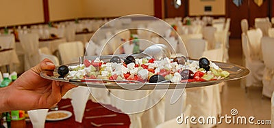 fresh prepared salad in a metal platter Stock Photo