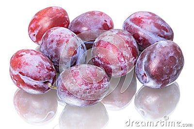 Fresh prunes on white Stock Photo
