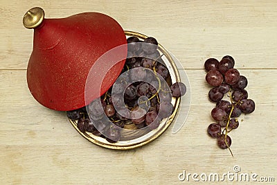 Fresh purple grape fruit on tajine morocco Stock Photo