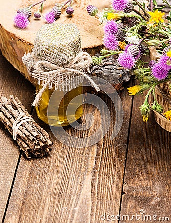 Fresh raw honey and wild flowers Stock Photo
