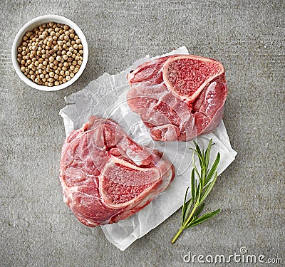 Fresh raw meat on white wrapping paper Stock Photo