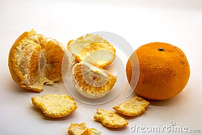 Peeled tangerine or mandarin fruit on white background cutout Editorial Stock Photo