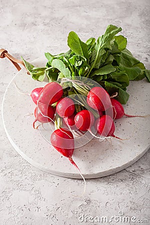 Fresh raw radish over gray background Stock Photo