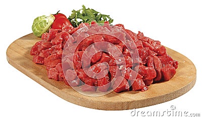 Fresh raw red cubed meat chunk on wooden cut board isolated over white background Stock Photo