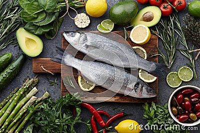 Fresh raw seabass and ingredients for cooking Stock Photo