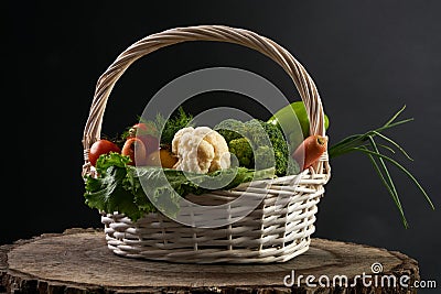 Fresh raw vegetables in a basket. Stock Photo