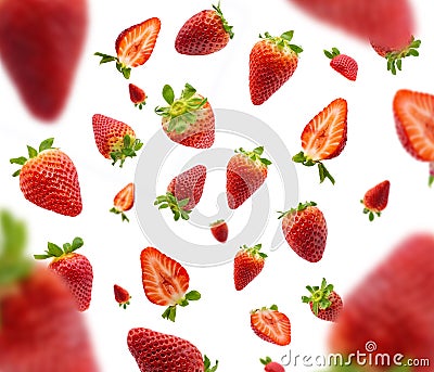 Fresh real red strawberry falling isolated on white background. Selective focus Stock Photo
