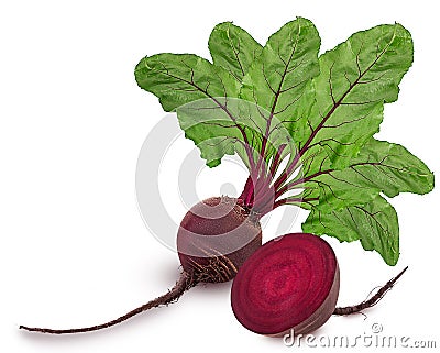 Fresh red beet root one whole and cut in half with green leaf Stock Photo