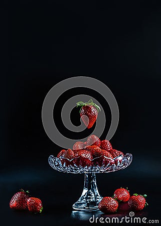 Fresh and red, exclusive strawberries in a special crystal bowl Stock Photo