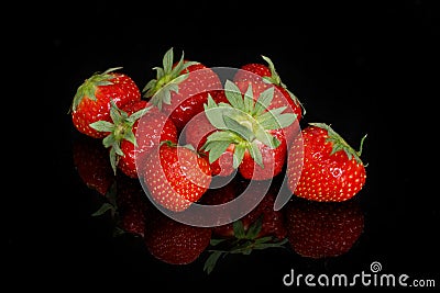 Fresh red ripe strawberries on a black background Stock Photo