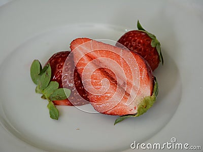 fresh red sweet strawberrys, Erdbeere, three strawberry fruits, Stock Photo