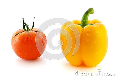 Fresh red tomato and yellow pepper Stock Photo