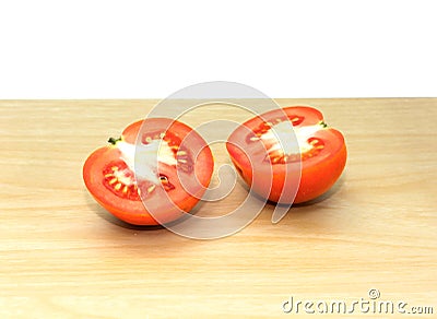 Fresh red tomatoes on wooden background. Stock Photo