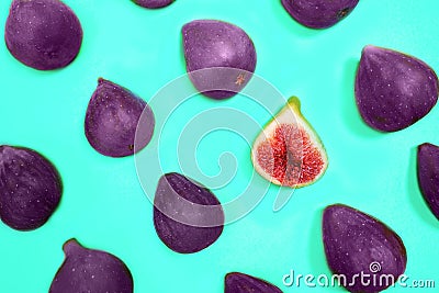 Fresh ripe figs on pastel mint green background. Stock Photo
