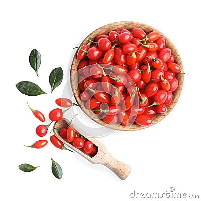 Fresh ripe goji berries, bowl and scoop on white background, top view Stock Photo