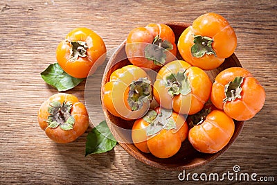 Fresh ripe persimmon fruit, top view Stock Photo